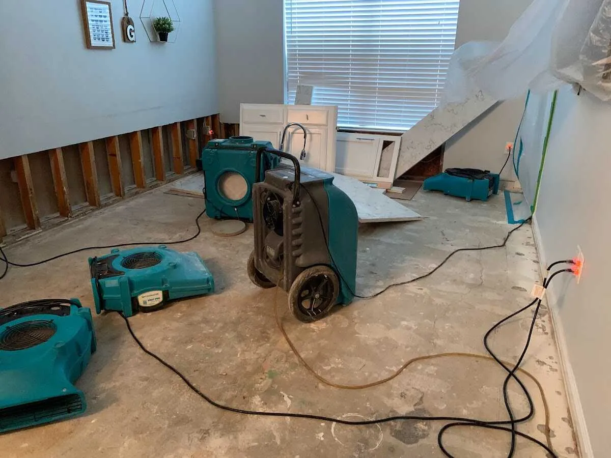 Dehumidifier in flood-cut room for Water Damage Restoration in Pikeville